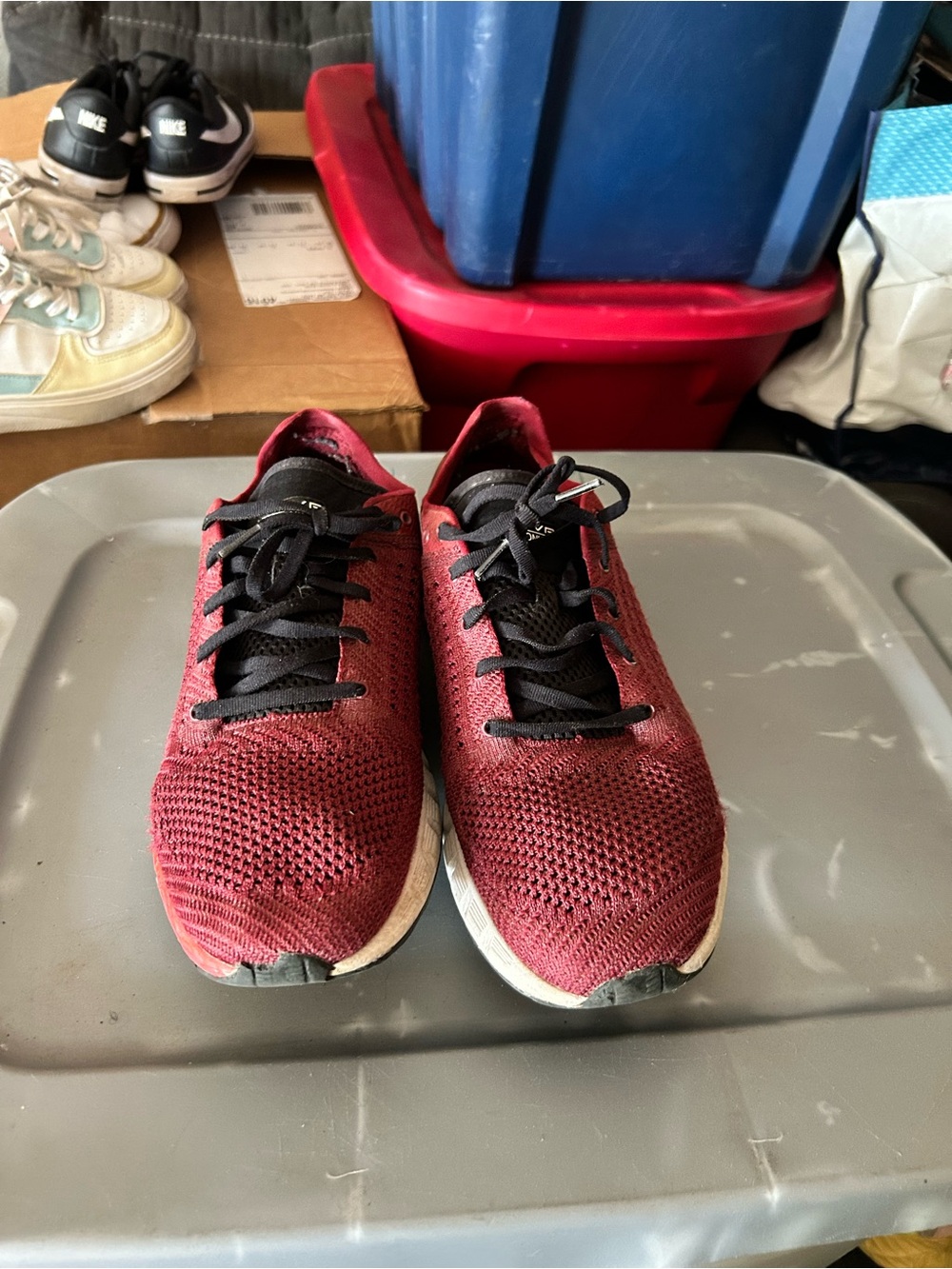 One Maroon and one black pair UA running shoes sz 11 bundle